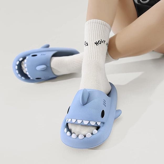 Funny shark-shaped slide sandals with open jaws and cushy soles for chomping through summer in style