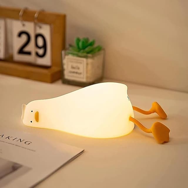 Cute glowing duck night light squished flat—perfect for kids' rooms, kawaii decor lovers, or anyone needing a cozy animal lamp buddy.